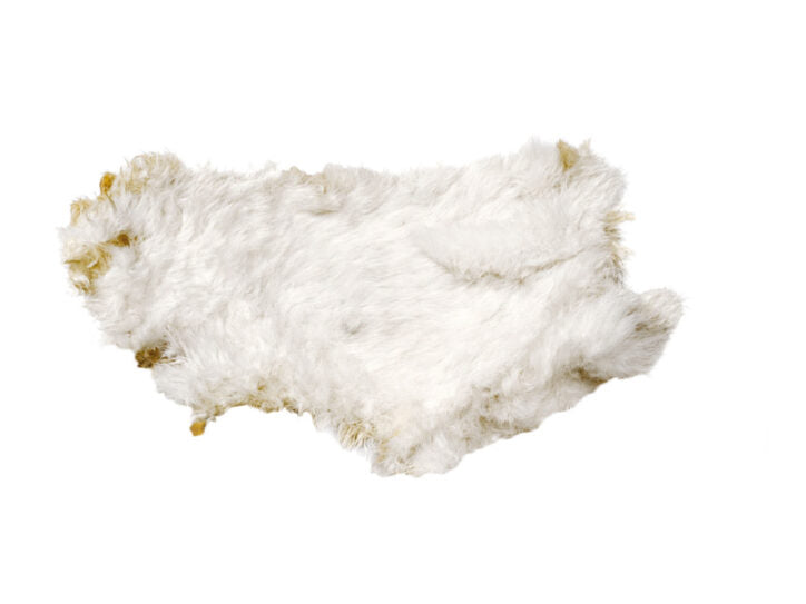 Peau de lapin avec poils pour chien
